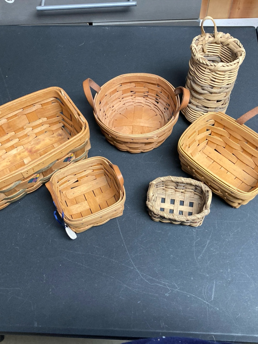 Bundle of six decorative baskets, Longaberger country woven candle